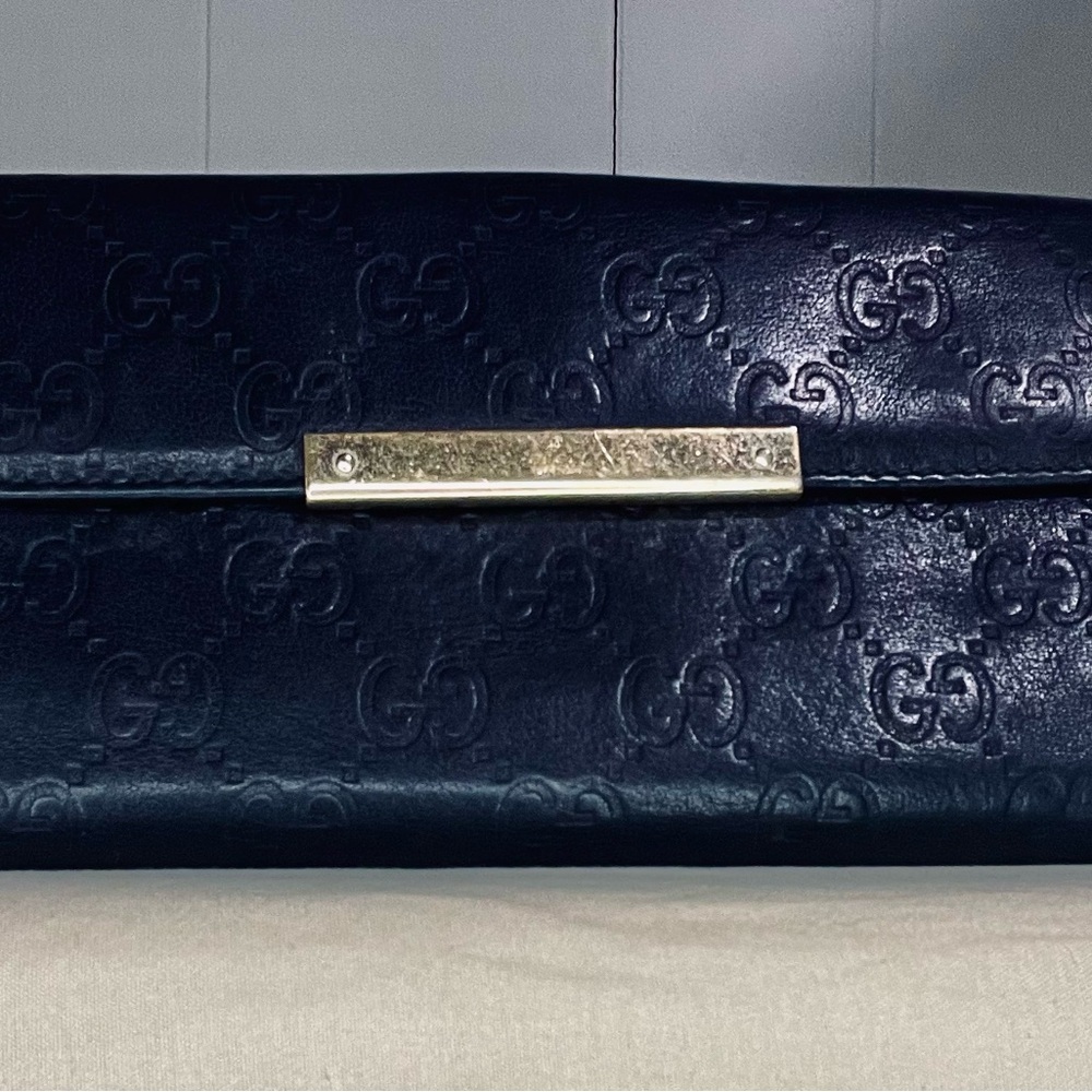 Gucci black leather GG Guccissima logo metal bar plate long wallet
